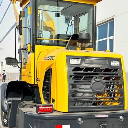 How do I calculate the tipping load of a wheel loader?