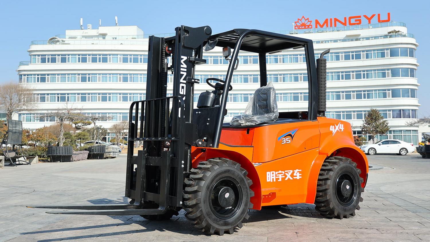 What are the common safety features on rough terrain forklifts?