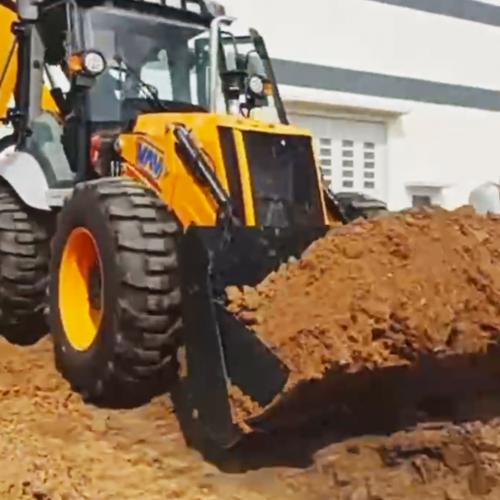 What are the common uses of a backhoe?